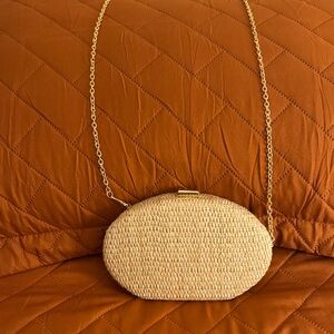 Woven Straw Oval Clutch with Gold Chain - Beige